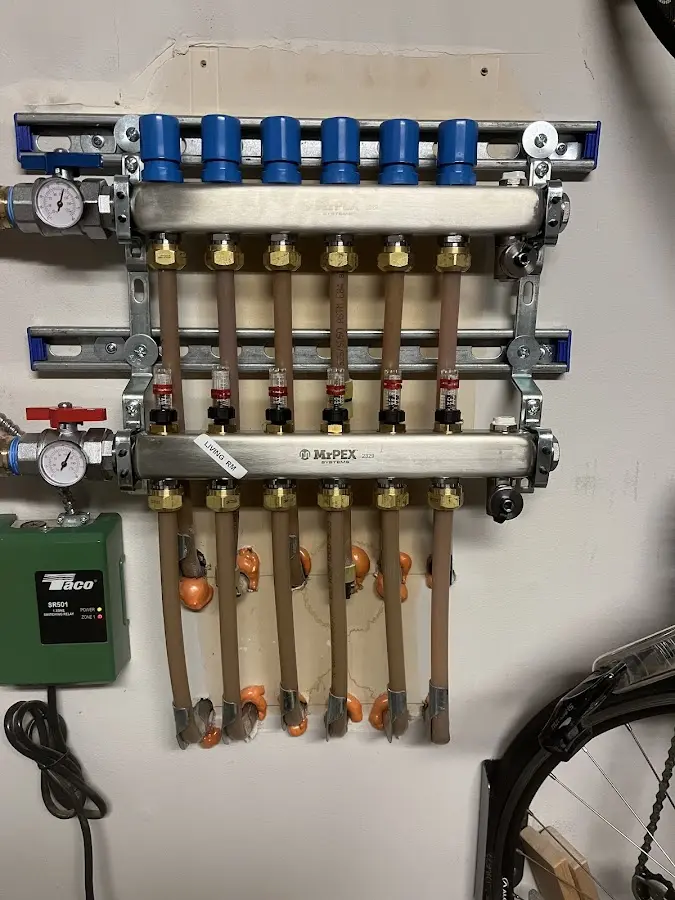 Plumber performing Water Heater Repair at a residential property in Powell